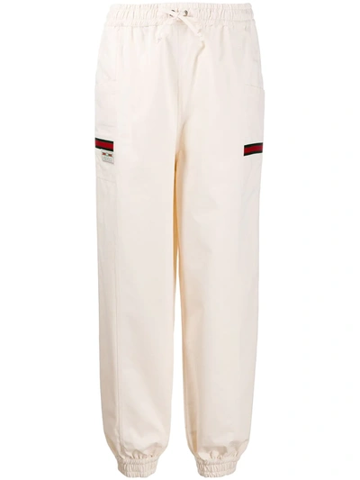 Gucci Logo Label Cotton Track Trousers In Beige