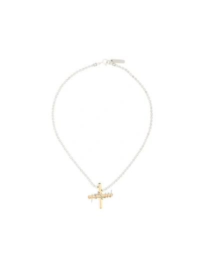 Le Chic Radical Mismatched Cross Necklace In Silver