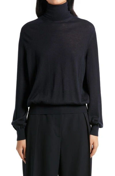 The Row Chanic Merino Wool And Cashmere-blend Turtleneck Sweater In Black