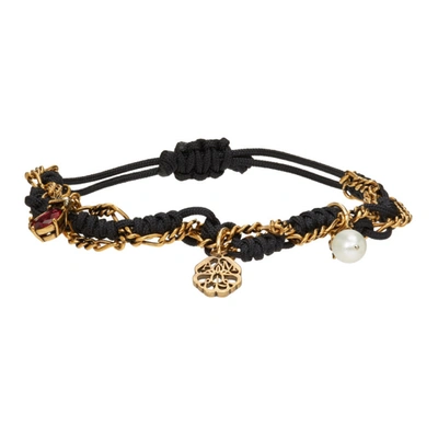 Alexander Mcqueen Gold-tone Friendship Charm Bracelet In Black