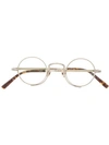 Matsuda Oval Frame Glasses In Gold