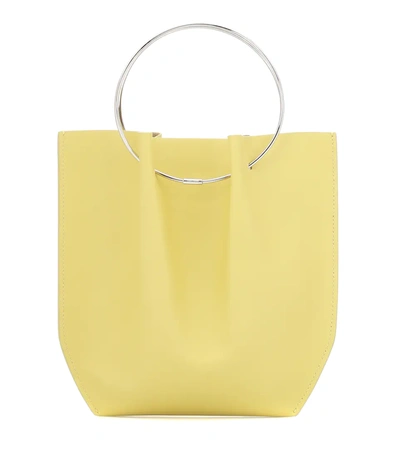 The Row Micro Flat Circle Leather Bucket Bag In Sherbet