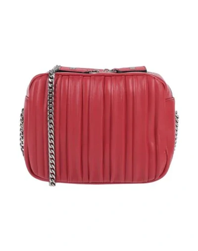 La Carrie Handbags In Brick Red