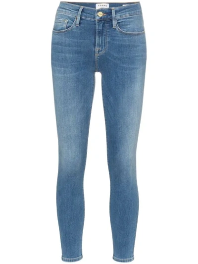 Frame Le Skinny De Jeanne Faded Mid-rise Skinny Jeans In Blue