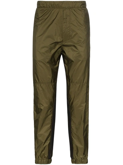 Prada Tapered Nylon Track Trousers In Grün