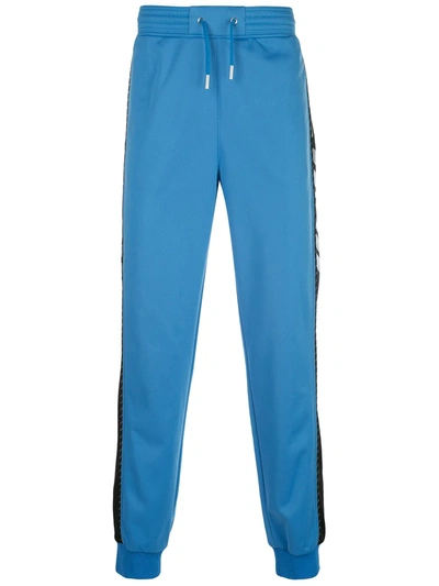 Givenchy Reflective Logo Stripe Track Pants In Blue