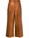 Arma Cropped Flared Leg Trousers In Brown