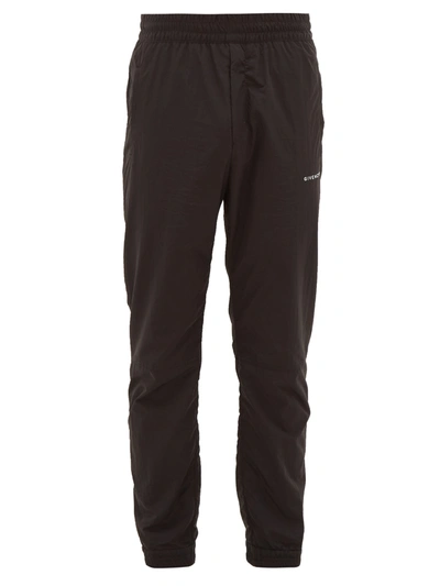 Givenchy Tapered Logo-print Shell Track Pants In Black