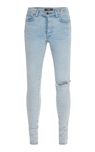 Amiri Broken Stretch Distressed Skinny Jeans In Blue