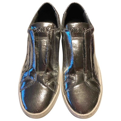Pre-owned Dkny Glitter Trainers In Silver