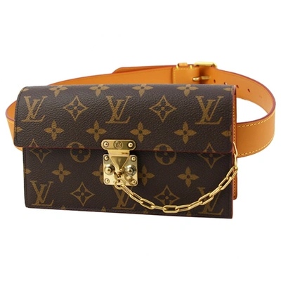 Pre-owned Louis Vuitton Cloth Clutch Bag In Brown