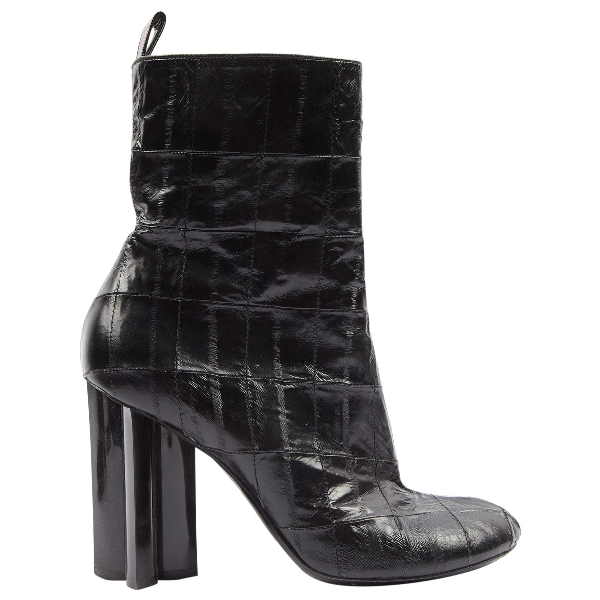 Pre-Owned Louis Vuitton Silhouette Black Eel Ankle Boots | ModeSens