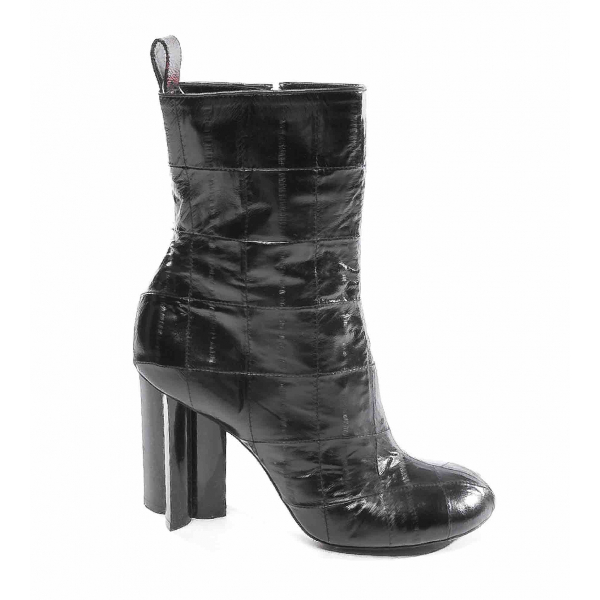 Pre-Owned Louis Vuitton Silhouette Black Leather Ankle Boots | ModeSens
