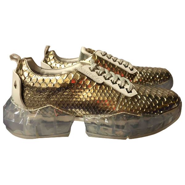 gold jimmy choo trainers