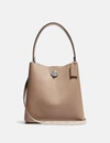 Coach Charlie Bucket Bag 21 In Blocked Signature Canvas In Beige