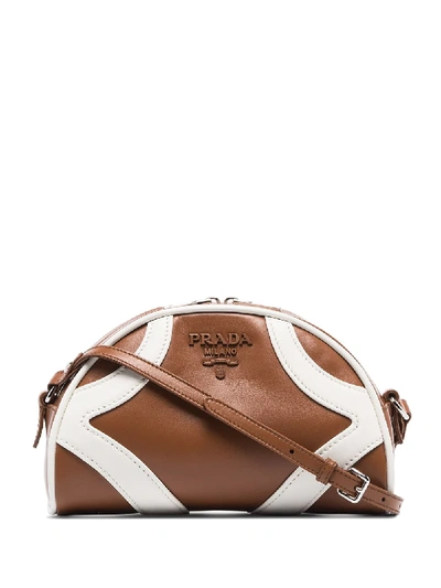 Prada Tonal Logo Plaque Bowling Bag In Brown