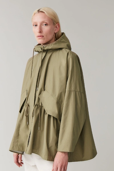 Cos Light Packable Raincoat In Green