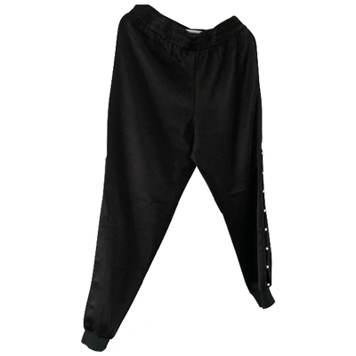 Pre-owned Alice And Olivia Trousers In Black