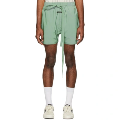 Fear Of God Wide-leg Belted Iridescent Nylon Shorts In Green