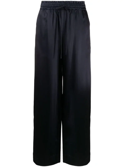 Co High-rise Flared Trousers In Blue