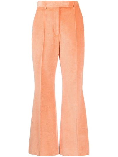 Acne Studios Flared Cropped Corduroy Trousers In Orange