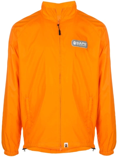 Bape X Coach Logo Print Zip-up Jacket In Orange