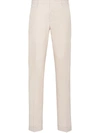 Prada Slim-fit Washed Cotton Trousers In Neutrals