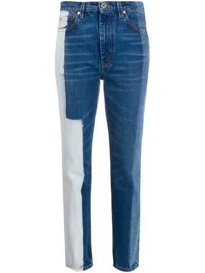 Heron Preston Bleach Panelled Tapered Jeans In Blue