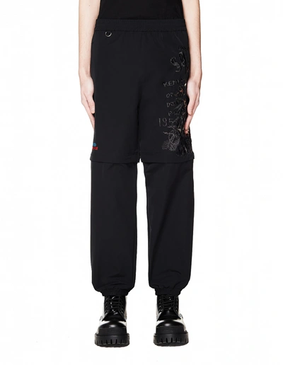 Doublet Embroidered Transformer Trackpants In Black