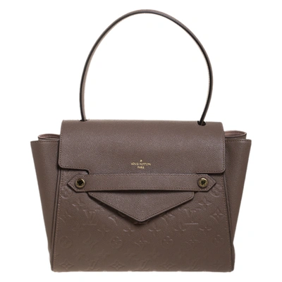 Pre-owned Louis Vuitton Bronze Monogram Empreinte Leather Trocadero Bag In Beige