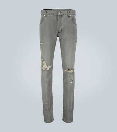 Balmain Distressed Skinny Jeans In Grey