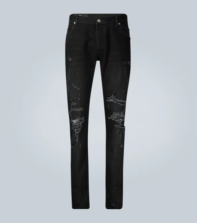 Balmain Slim-cut Ripped Cotton Jeans In Black