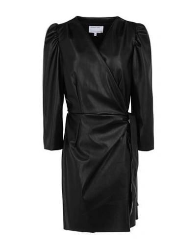 Designers Remix Short Dresses In Black