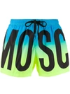 Moschino Logo Printed Shaded Swim Shorts In Blue