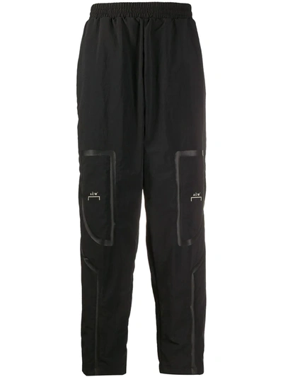 A-cold-wall* Logo Print Taped Nylon Track Pants In Black