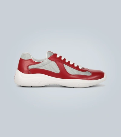 Prada Patent Leather And Functional Fabric Sneakers In Red