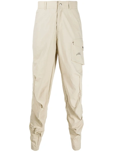 A-cold-wall* Logo Print Nylon Track Trousers In Neutrals