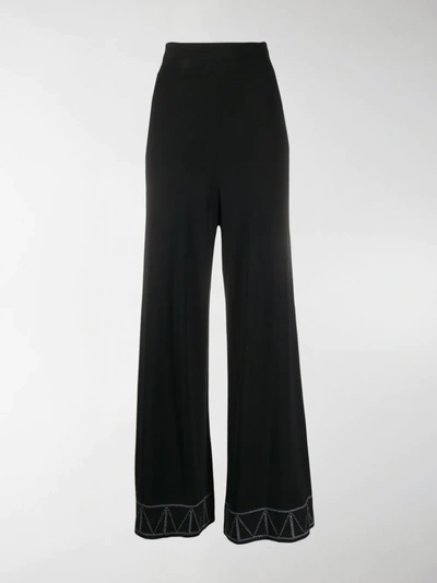 Alaïa High-waisted Pull-on Palazzo Pants In Black