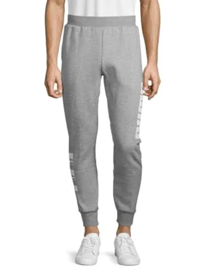 Puma Regular-fit Cotton-blend Jogger Pants In Grey