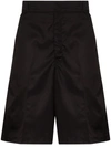 Prada Logo Plaque Bermuda Shorts In Black