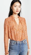 Free People Lela Floral Smocked Ruffle Blouse In Coral