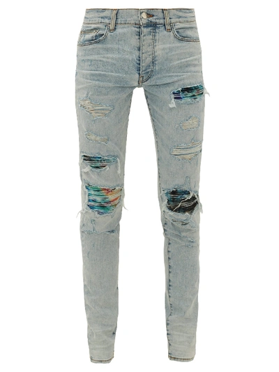 Amiri Tie-dye Underlay Skinny Stretch-denim Jeans In Blue