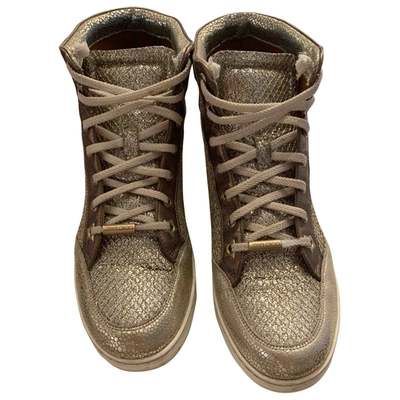 Pre-owned Jimmy Choo Cloth Trainers In Gold