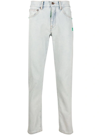Off-white Bleached Slim Cotton Denim Jeans In Light Wash