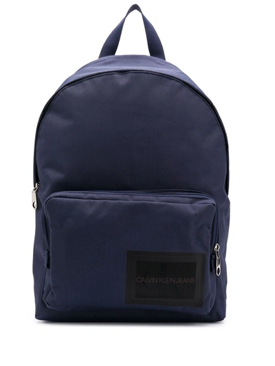 Calvin Klein Logo Stamp Backpack In Blue