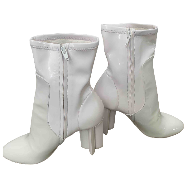 Pre-Owned Louis Vuitton Silhouette White Patent Leather Ankle Boots | ModeSens