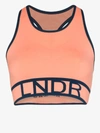 Lndr Buck Logo Band Sports Bra In Orange