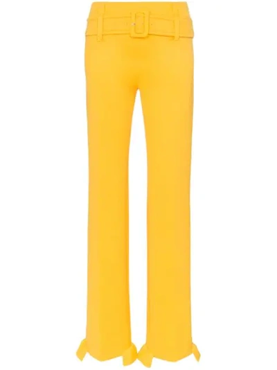 Prada Belted Ruffle-trimmed Scuba Straight-leg Trousers In Yellow