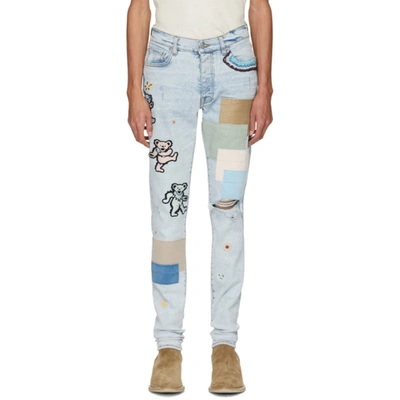 Amiri Dancing Bear-embroidered Patchwork Denim Jeans In Blue
