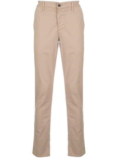 Ag Jamison Mid-rise Chinos In Sulfur Wild Truffle